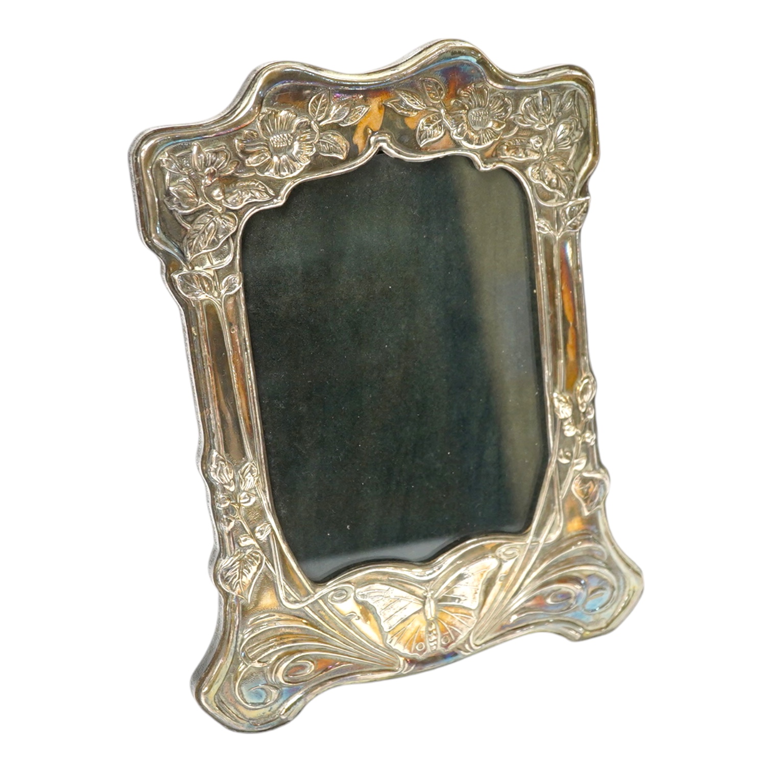 A modern Art Nouveau style Britannia standard silver mounted photograph frame, Birmingham, 1993, 20.5cm. Condition - fair to good